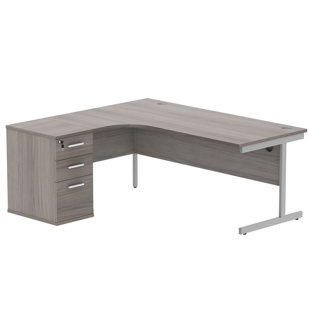 Single Upright Left Hand Radial Desk + Desk High Pedestal (FSC) | 600mm Deep Pedestal | 1800 X 1200 | Alaskan Grey Oak/Silver
